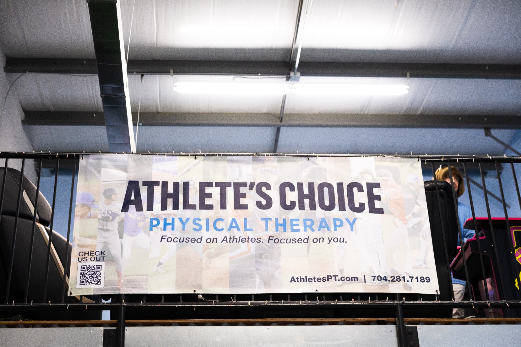 Athlete's Choice PT branded banner inside the Fort Mill clinic